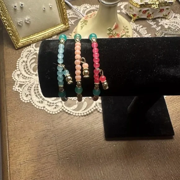 pink, light pink, and blue beaded bracelet. - Picture 2 of 2